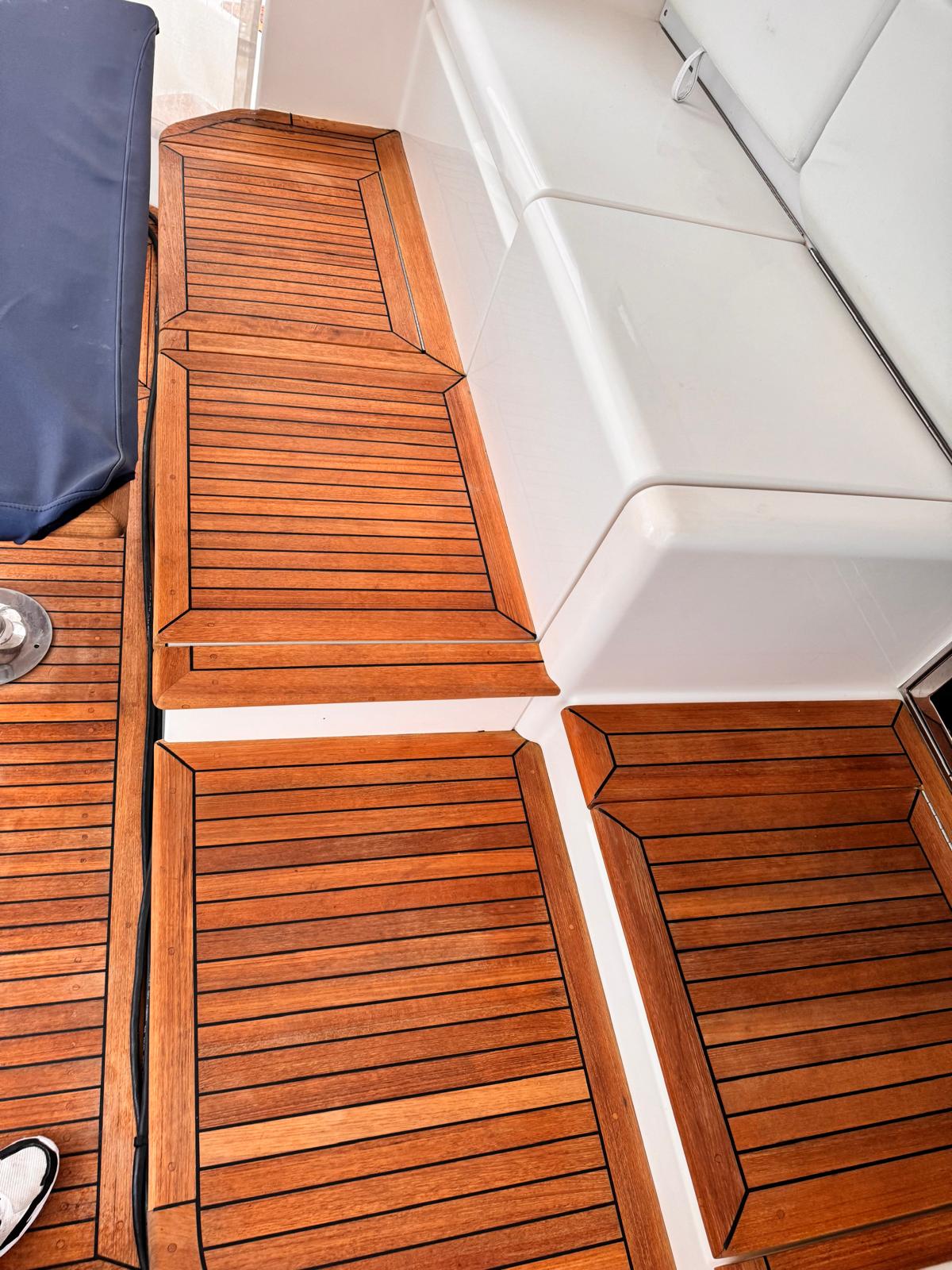Professional teak restoration, managed from start to finish.